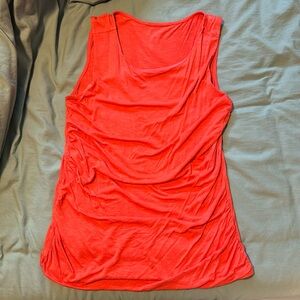 Orange blouse. Size M. Lightly worn.